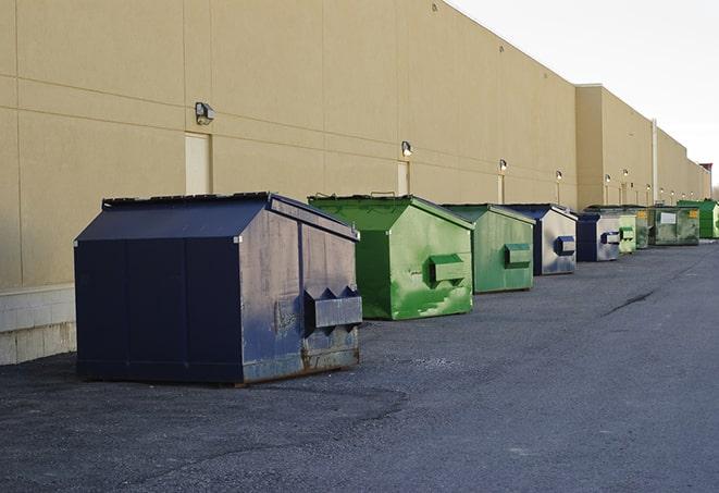 waste disposal bins at a construction zone in Coweta